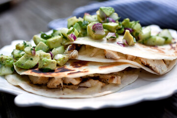 Chicken quesadilla with cucumber and avocado salsa