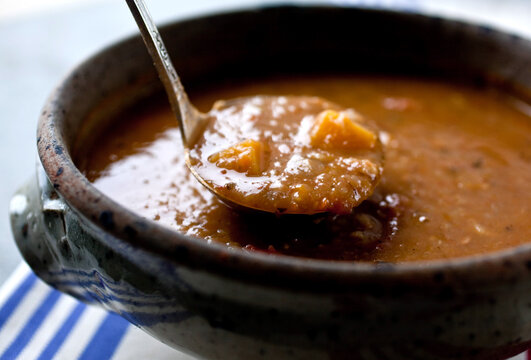 Bean and farro soup with cabbage and winter squash in pot