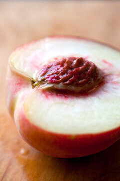 Close up of peach sliced in half