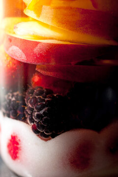 Close up of traditional rumtopf in jar