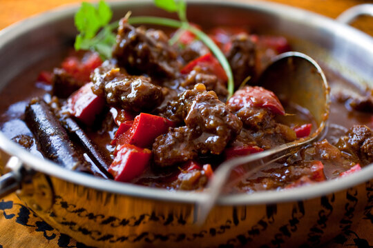 Close up of pork Vindaloo in pot
