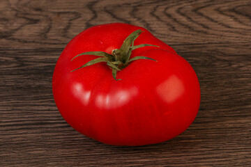 Ripe tasty red big tomato