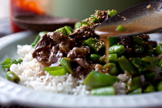 Close Up Of Fried Beef With Rice And Sugar Snap Peas