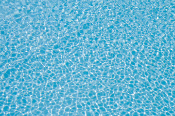 Swimming pool waves in light blue, abstract background, meditation for gift card, space for text
