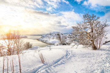 Breathtaking winter scenery with lots of snow  in small fishing village and snowy  mountain peaks near Valberg.