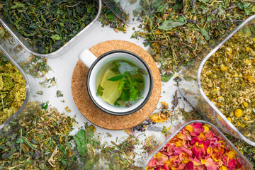 healing herbs and healthy tea with lemon