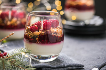Raspberry Panna cotta or .parfait with raspberry jelly, Italian dessert, homemade cuisine. Copy...