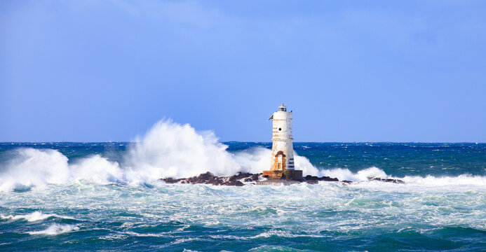 lighthouse of the mangiabarche of calasetta in a stormy day, sardinia
