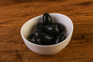 Pickled black olives in the bowl