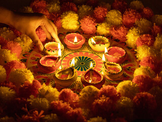 Clay Diya  or lamp with rangoli  stock image.