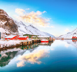 Outstanding panoramic view of small fishing village Ramberg at sunrise.