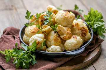 Buffalo baked Cauliflower with barbeque sauce. Vegan Food.