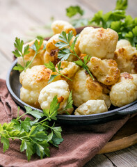 Buffalo baked Cauliflower with barbeque sauce. Vegan Food.