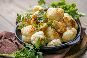 Buffalo baked Cauliflower with barbeque sauce. Vegan Food.