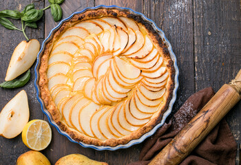 La Tarte Bourdaloue - French pear tart or pie with fresh pear fruits - obrazy, fototapety, plakaty