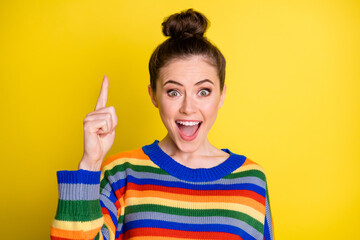 Photo of young excited amazed girl genius idea plan point index finger up happy smile isolated over...