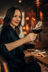 lady in the bar toasting