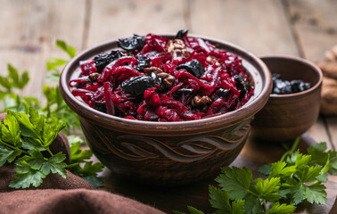 Christmas salad with beets, prunes and nuts