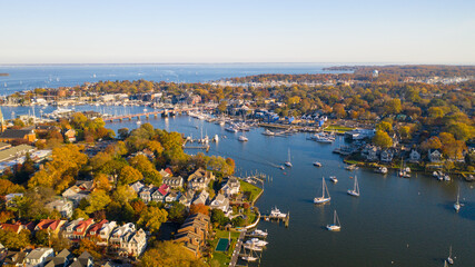 Aerial view of colorful sailboat moorings and docks on Spa Creek, in historic downtown Annapolis Maryland on a fall day - obrazy, fototapety, plakaty