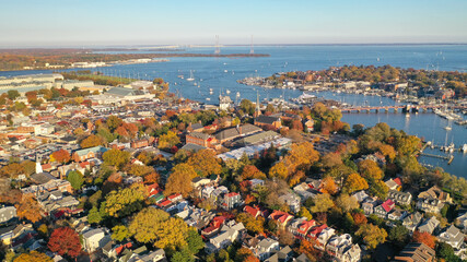 Fototapeta na wymiar Aerial view of colorful sailboat moorings and docks on Spa Creek, in historic downtown Annapolis Maryland on a fall day