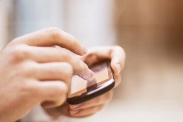 Modern people doing business, graphs and charts being demonstrated the screen of a phone