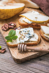 Toast or canape  with goat cheese, thyme, honey.  Delicious appetizer, ideal as an aperitif.