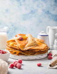 Homemade recipe of thin crepes (Blini) for breakfast or dessert.