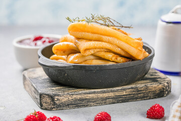 Homemade recipe of thin crepes (Blini) for breakfast or dessert.