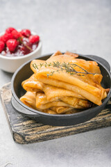 Homemade recipe of thin crepes (Blini) for breakfast or dessert.