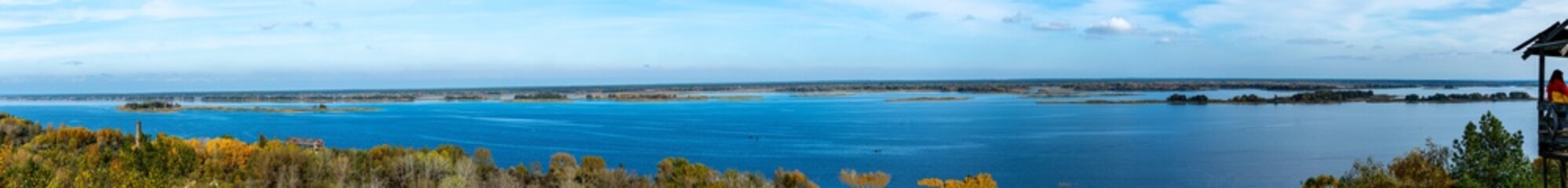 Panorama of Dnieper river with abandoned garden house near Stayky, Kyiv district, autumn