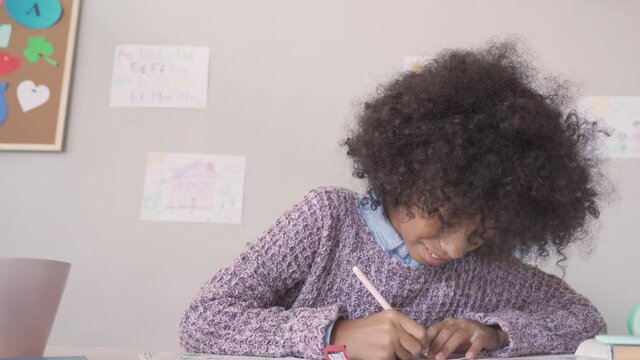 Happy african american kid child girl school student looking at web cam talking with remote teacher distance learning video conference call virtual class lesson, headshot zoom portrait, webcam view. 