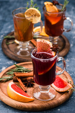 Various Autumn Or Winter Seasonal Alcohol Hot Cocktails - Mulled Wine, Grog, Warm Ginger Ale, Hot Rum, Punch, Mulled Apple Cider