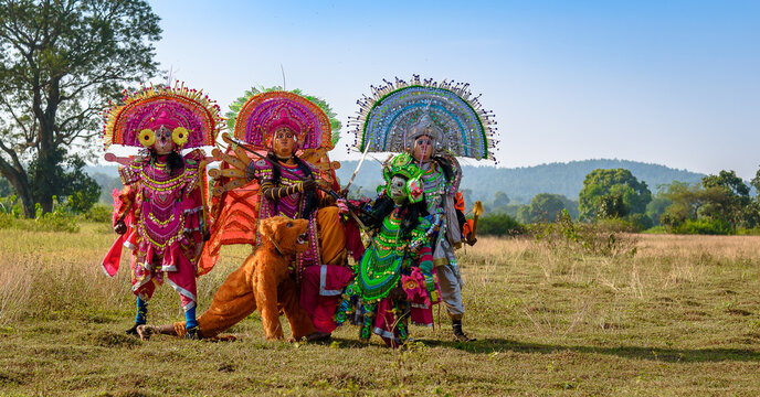 Group of Chhau Dancers as Goddess Durga with her family .