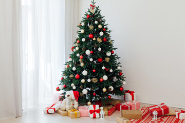 New Year's background Christmas tree with gifts interer decor