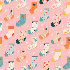 Colorful Christmas socks seamless pattern. Cute hand-drawn vintage cartoon socks on a pink background. Trendy vintage illustration for stationery, web, textile, wrapping paper. Modern childish design.
