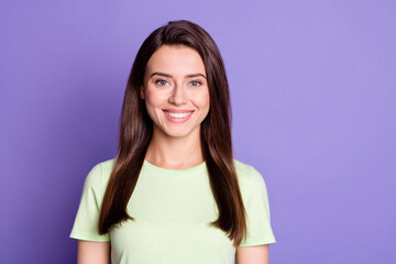 Portrait of nice young satisfied person look you camera wear light green isolated on vibrant purple color background