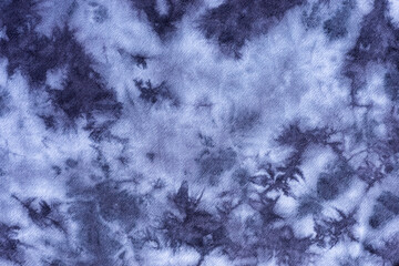 tie dye pattern hand dyed on cotton fabric abstract background.
