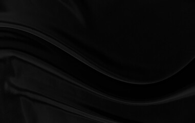 Black gray satin dark fabric texture luxurious shiny that is abstract silk cloth background with patterns soft waves blur beautiful.