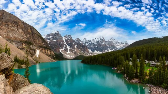 Cinemagraph Continuous Loop Animation. Beautiful view of an Iconic Famous Place, Moraine Lake. Blue Sky Sunny Summer Day. Located in Banff National Park, Alberta, Canada.