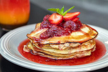 pancakes with strawberry syrup