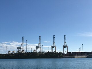 Fototapeta na wymiar Port of Miami Cargo Terminal Cranes View. Photo image