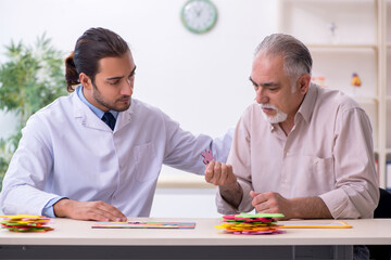 Doctor and patient suffering from Alzheimer disease