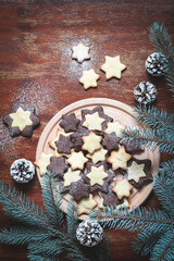 Flat lay of homemade star shape cookies on a wooden table