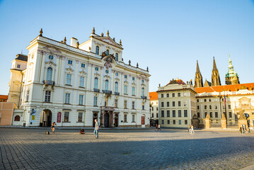 Fototapeta na wymiar Prague, Czech republic - September 19, 2020. Hradcanske namesti Square without people during travel restrictions - Archbishop Palace
