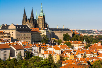 Obraz premium Prague, Czech republic - September 19, 2020. Panorama of Prague Castle and orange roofs around