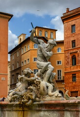 Fontana del Nettuno, fountain of Neptune, in colorful Piazza Navona, Roma, Italy
