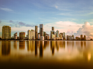 city skyline at sunset downtown miami florida usa reflection cityscape beautiful buildings panoramic water sky 