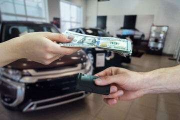 the buyer gives money to buy or rent a new car