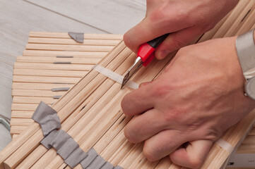 unpacked packaging of birch slats on the floor