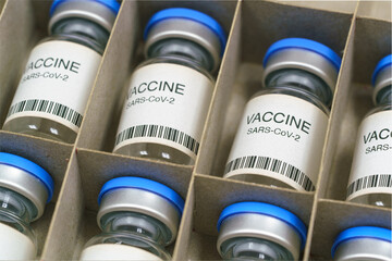 Coronavirus COVID-19 vaccine. SARS-Cov-2 Ncov-2019 vaccine ampoules  in a box.